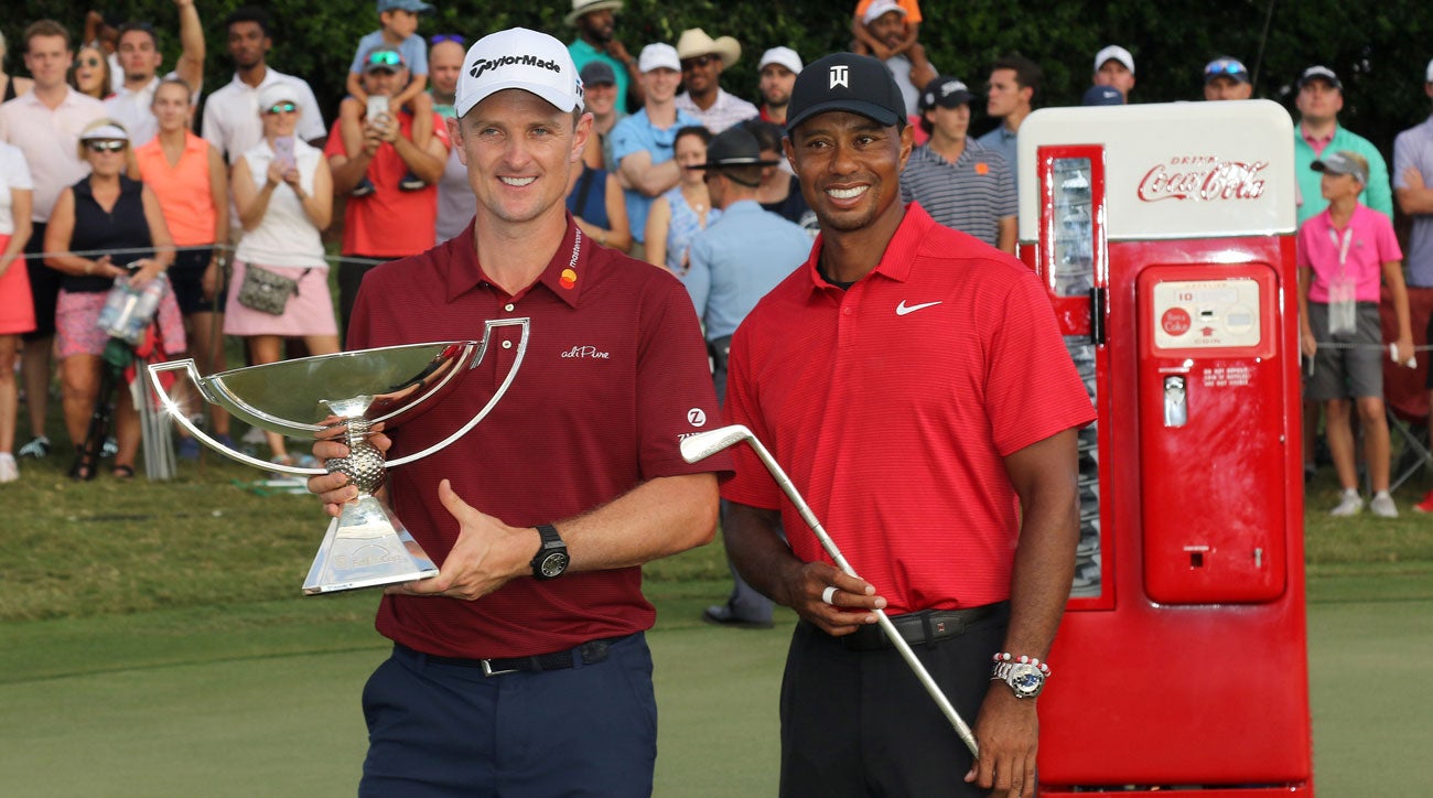Justin Rose and Tiger Woods pose after tje 2018 Tour Championship.