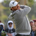 J.B. Holmes watches a tee shot during the final round of the Genesis Open on Sunday.