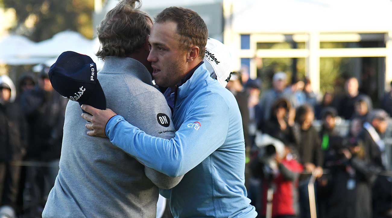 Justin Thomas congratulates J.B. Holmes for winning the Genesis on Sunday.