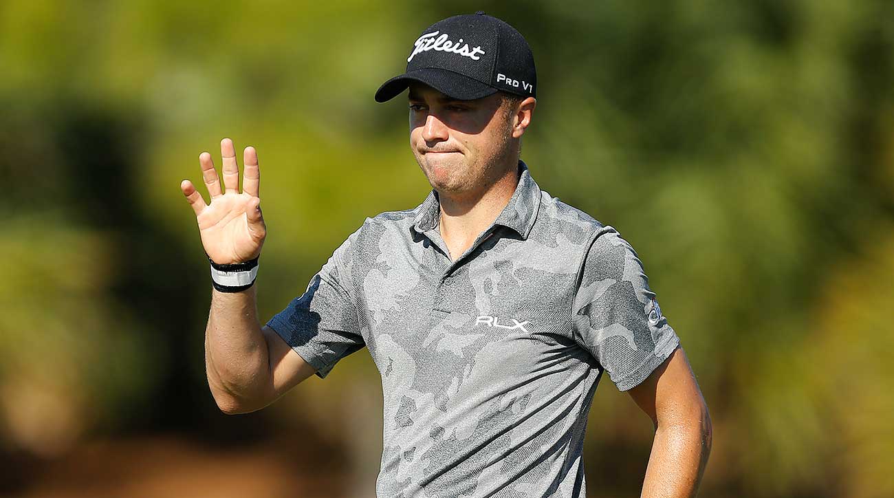 Justin Thomas waves to the Honda Classic crowd on Saturday.