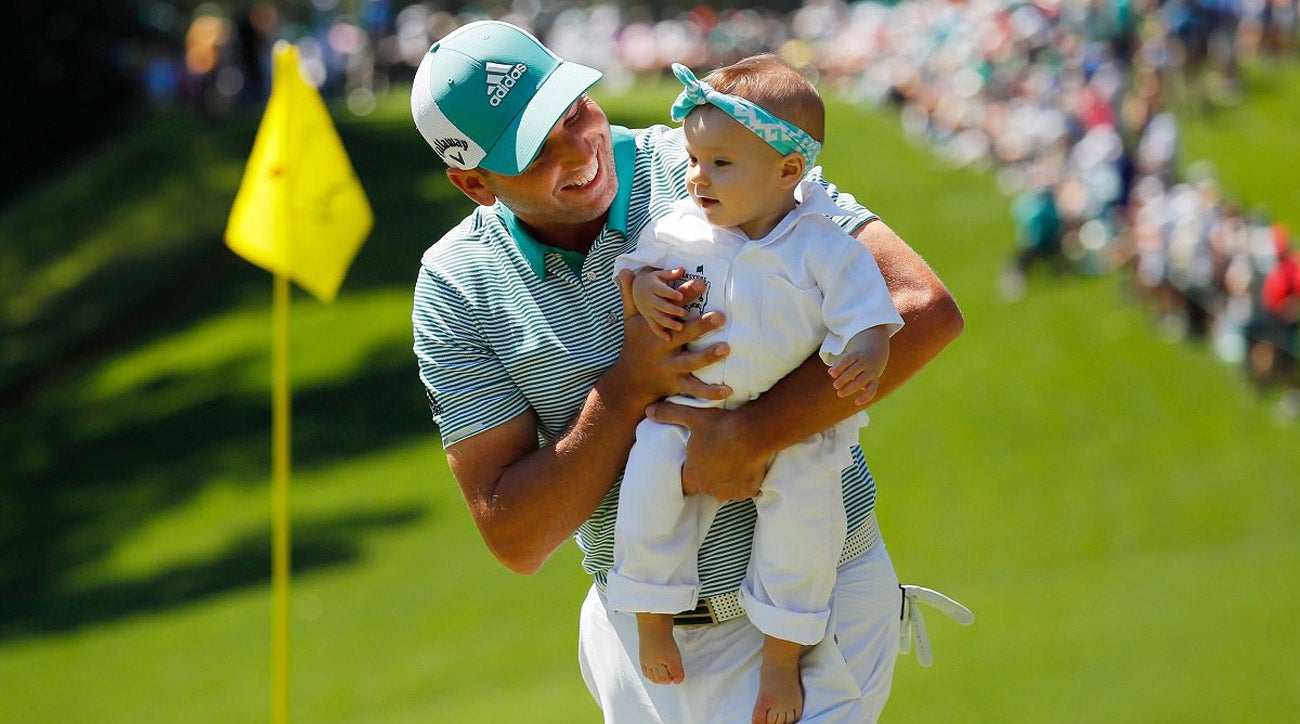 Sergio Garcia and his baby daughter.
