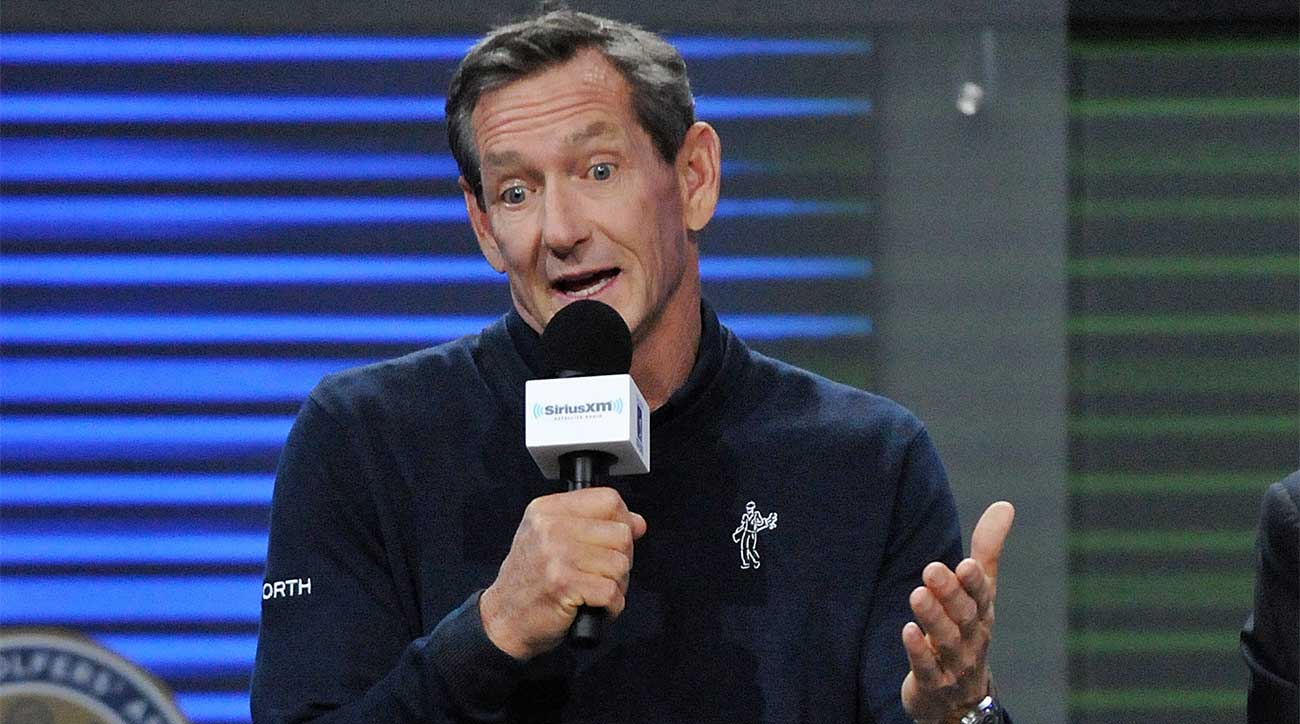 Hank Haney speaks on stage.