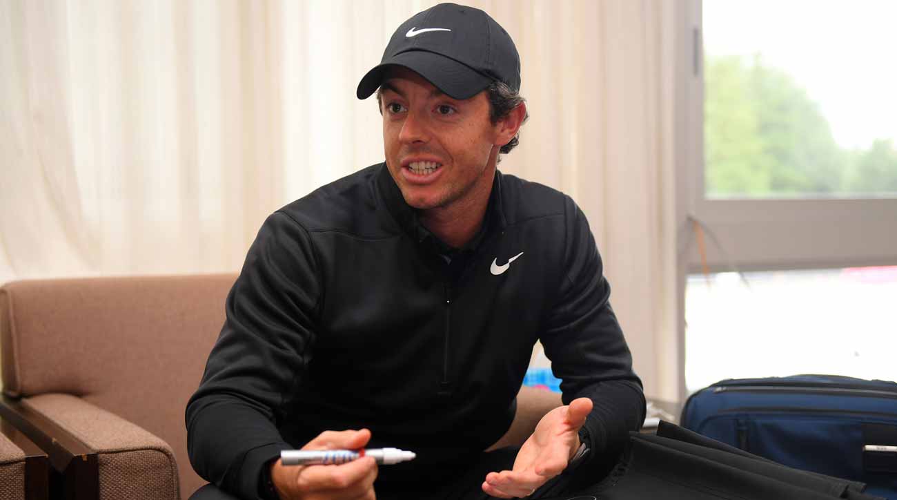 Rory McIlroy signs autographs before his Japan Skins game against Tiger Woods, Hideki Matsuyama and Jason Day.