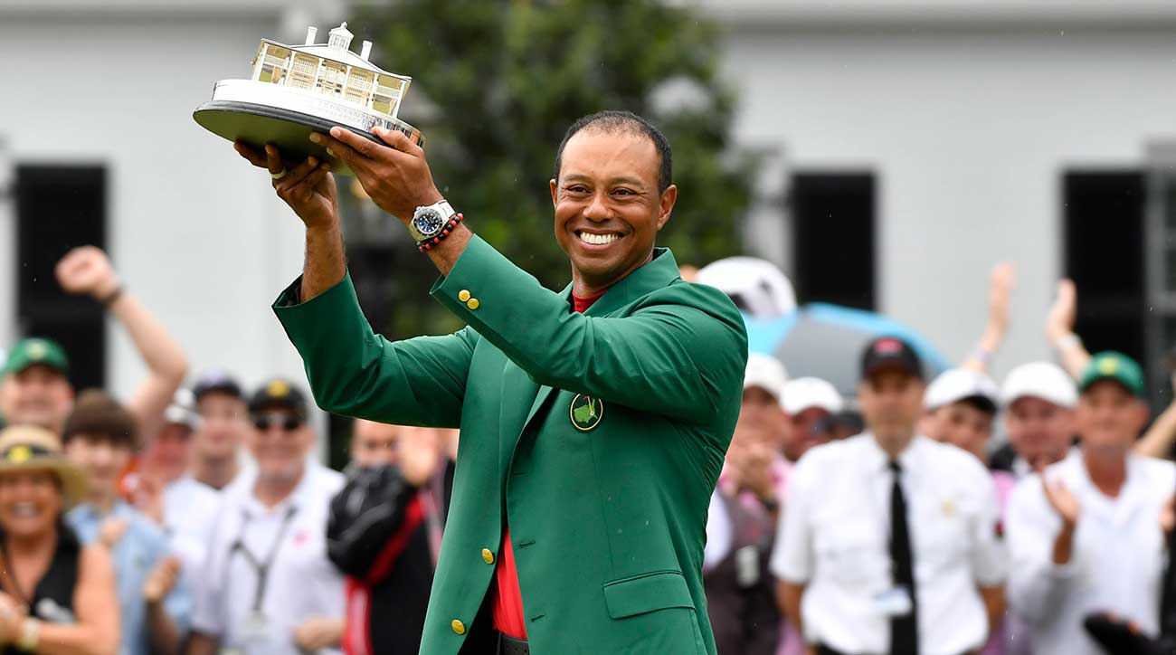 Tiger Woods holds up his trophy after winning the 2019 Masters at Augusta National.