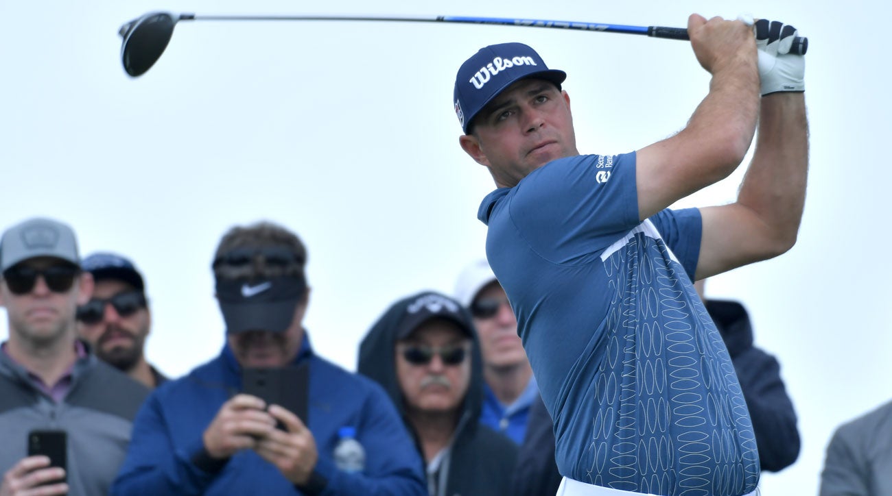 Gary Woodland tees off at the Farmers Insurance Open.