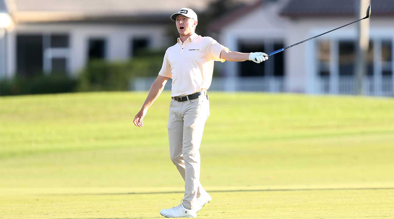 Mackenzie Hughes watches his second shot on the 18th hole sail into the grandstands at the Honda Classic on Sunday.