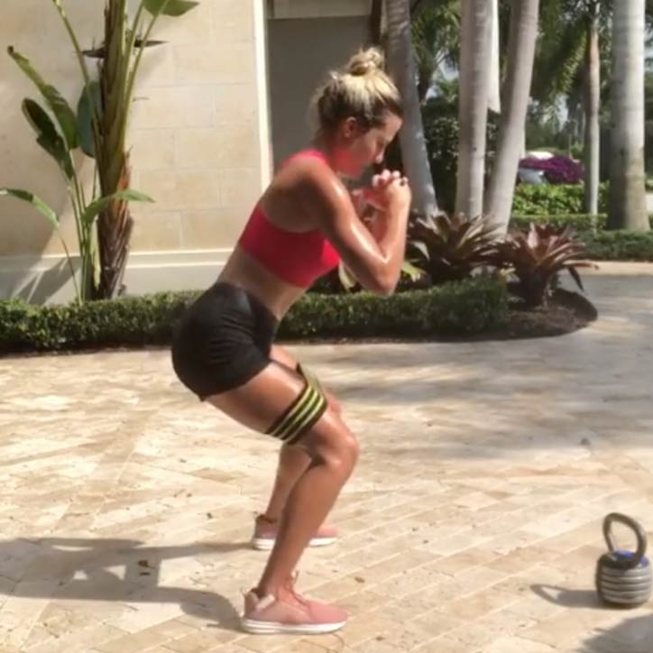 The final exercise in Lexi's workout is a banded monster walk.