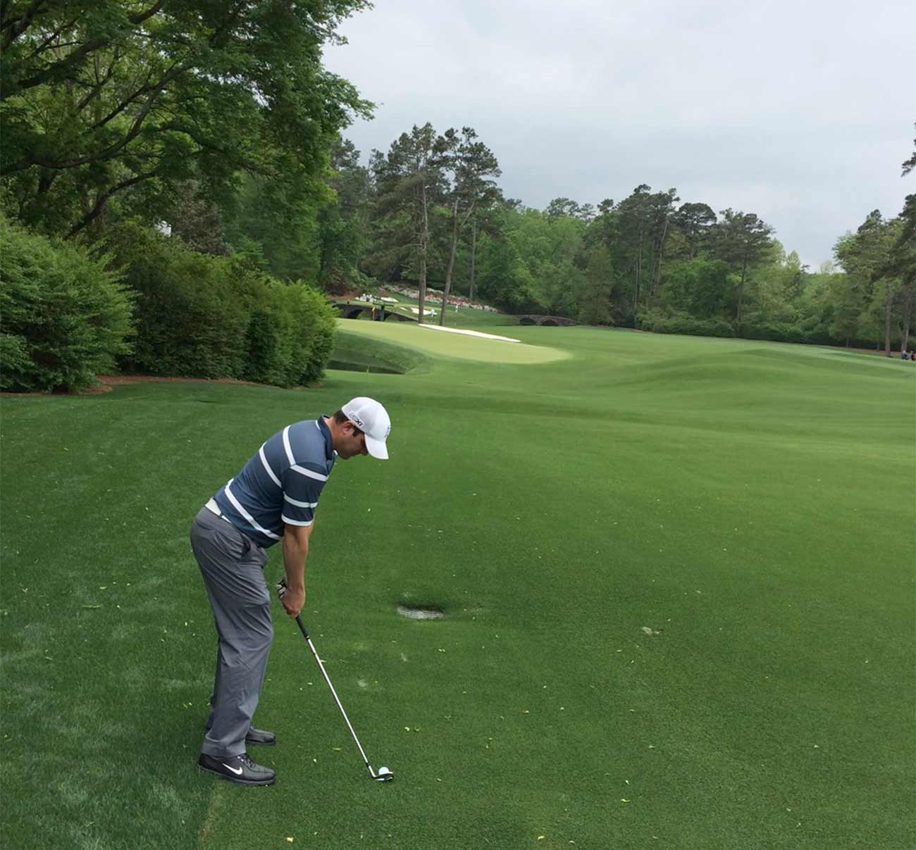 John Sodaro hits an approach to the 11th hole.