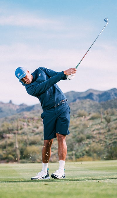 Tony Finau takes a swing.