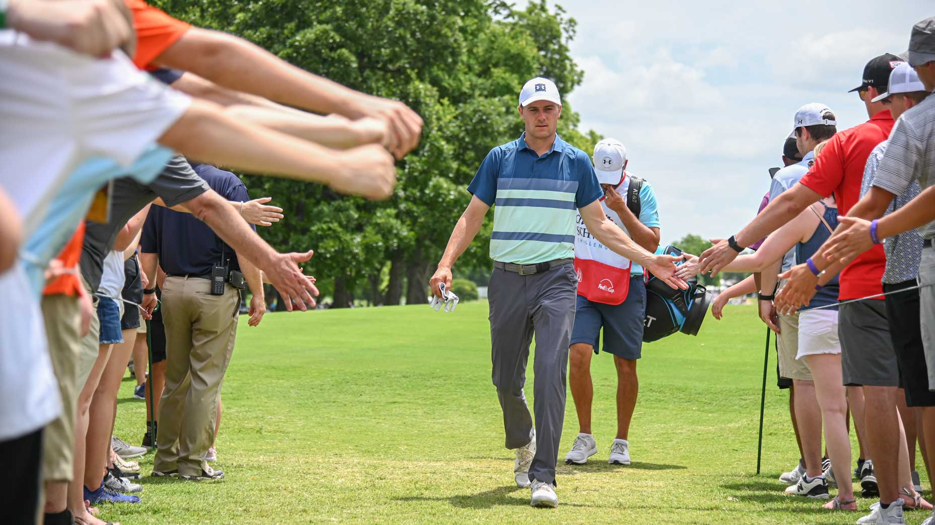 Jordan Spieth greets fans during last year's Charles Schwab Challenge.