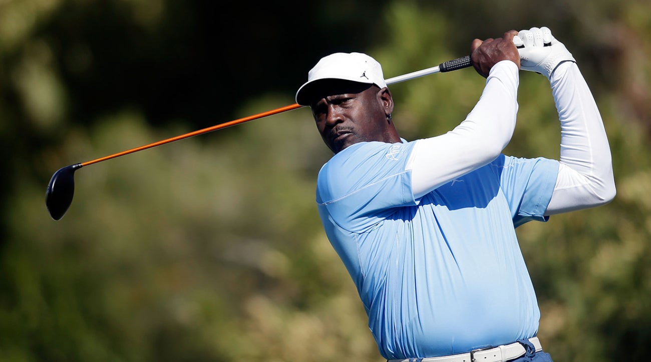 Michael Jordan hits a tee shot.