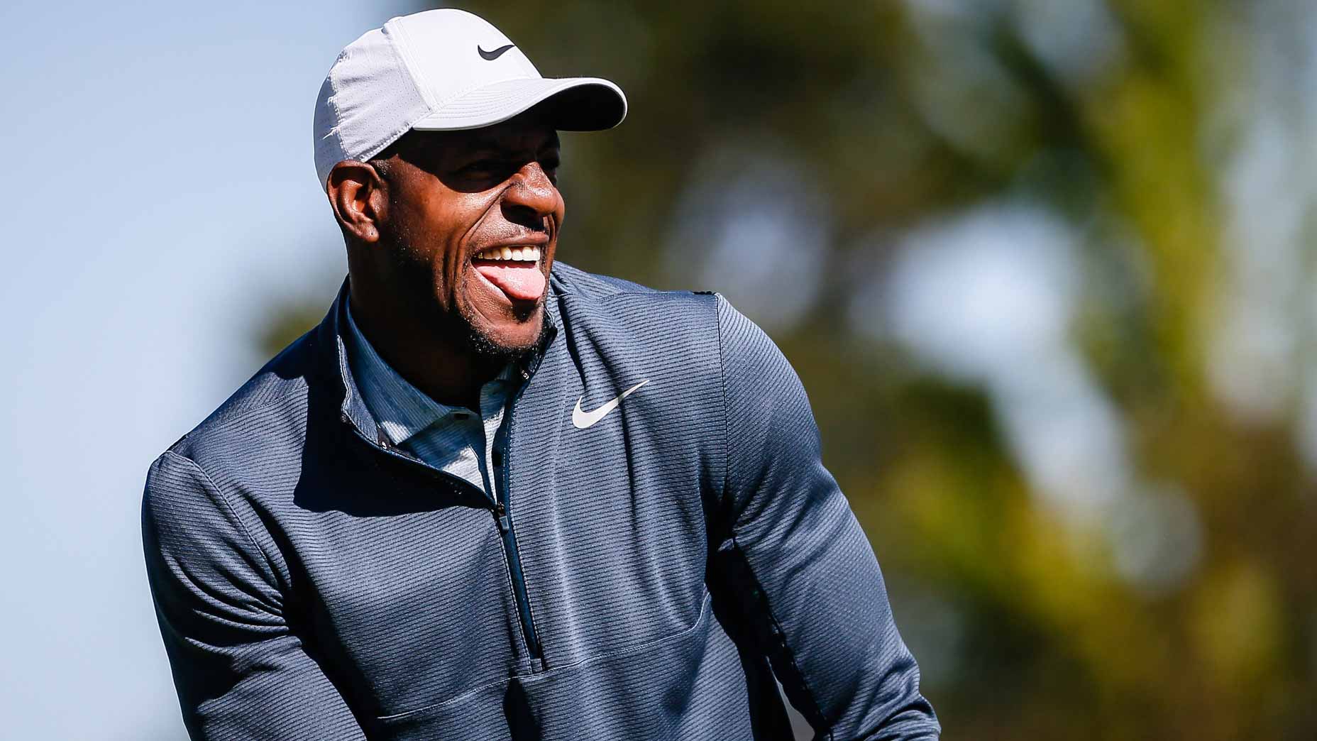 NBA star Andre Iguodala watches golf shot