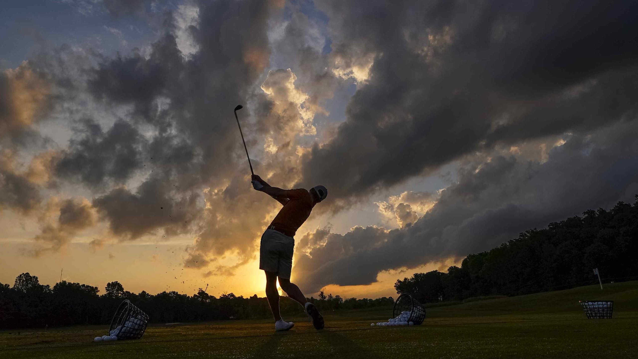 college golfer on range