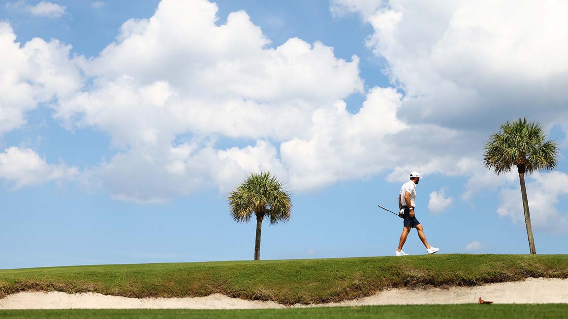dustin johnson walks course