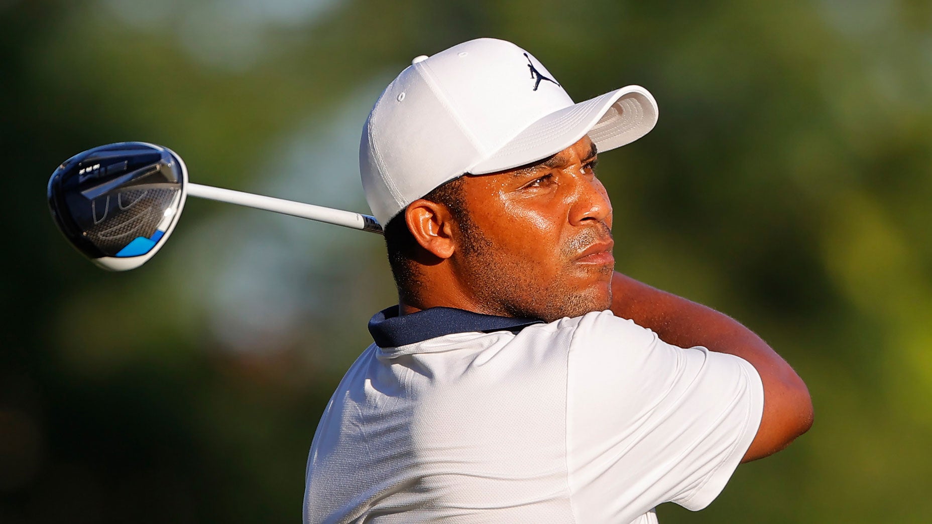 Harold Varner hits his tee shot on the 11th hole.