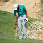 Rules Guy: Where do you drop a ball that carries a penalty area, but ricochets backward into it?