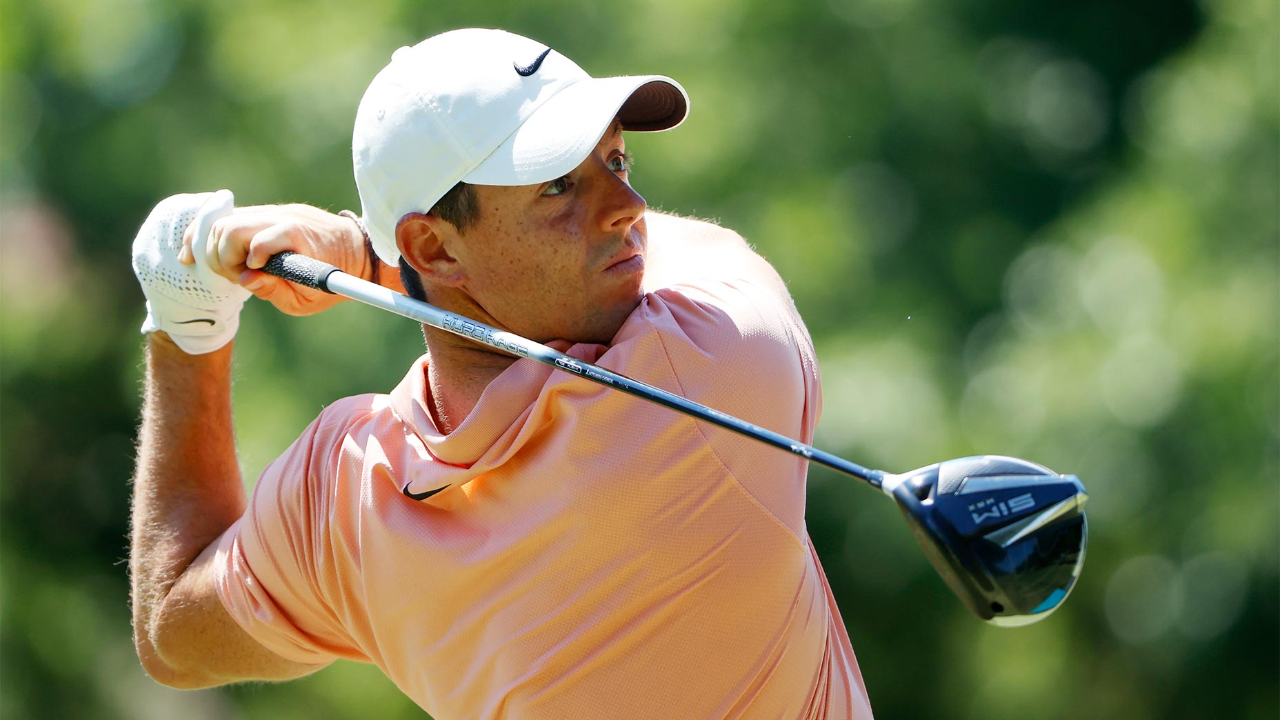 Rory McIlroy swings a golf club.