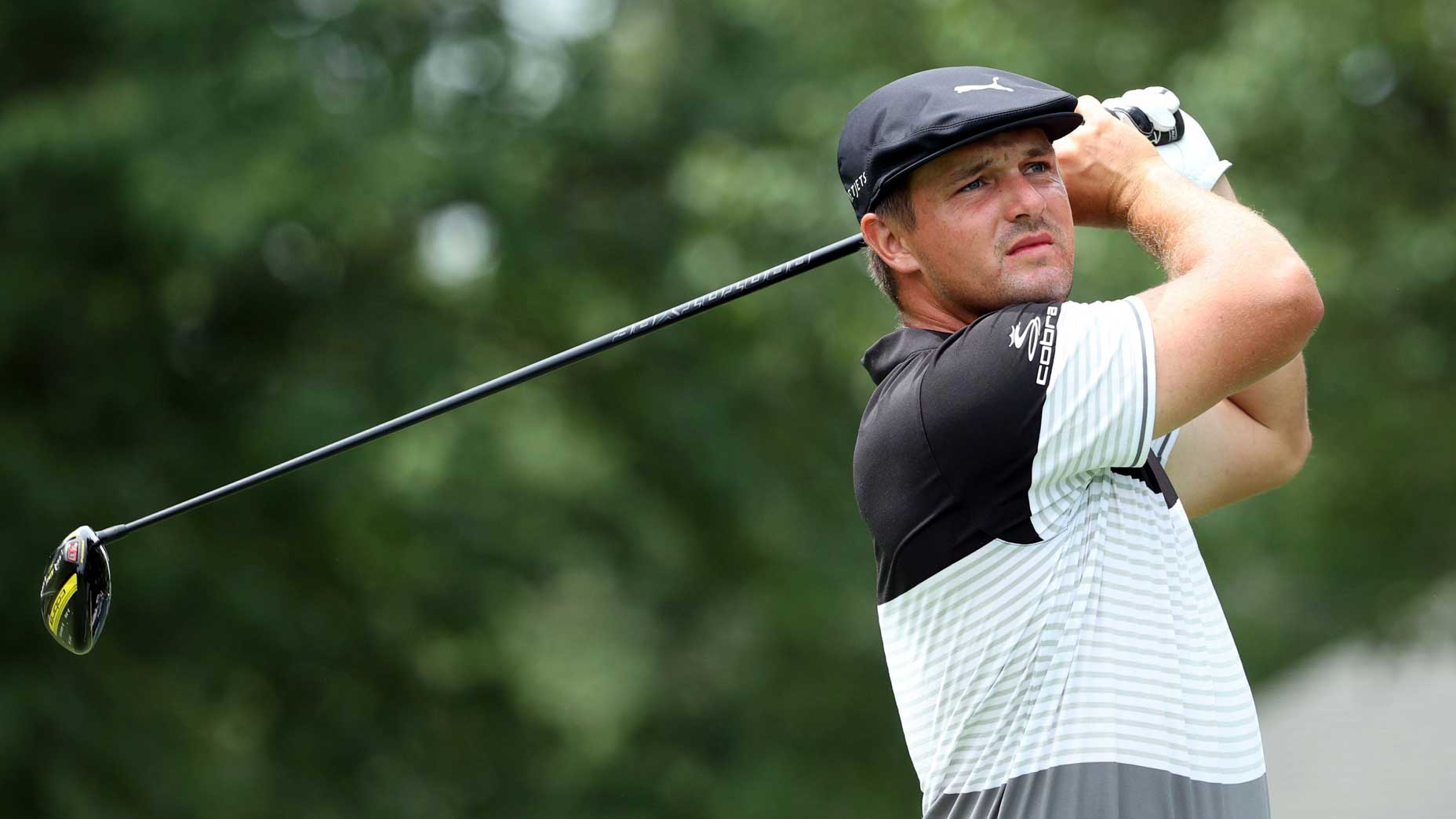 Pro golfer Bryson DeChambeau hits drive