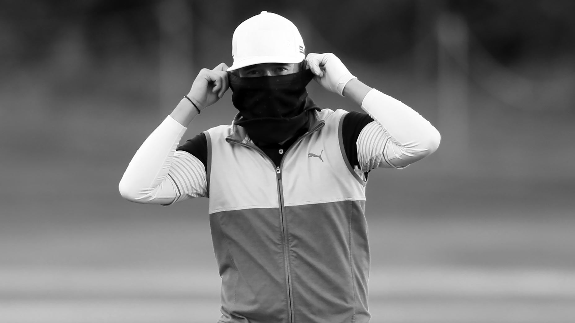 masked golfer