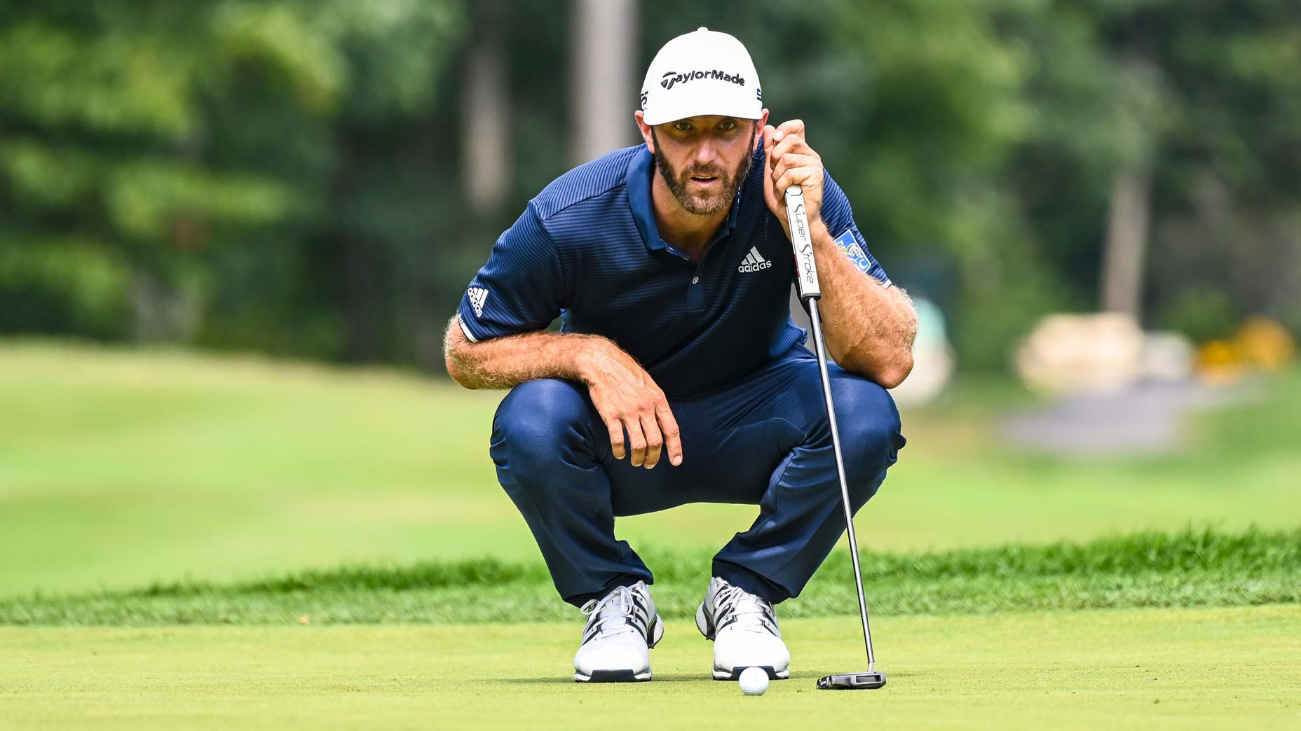 dustin johnson reads putt