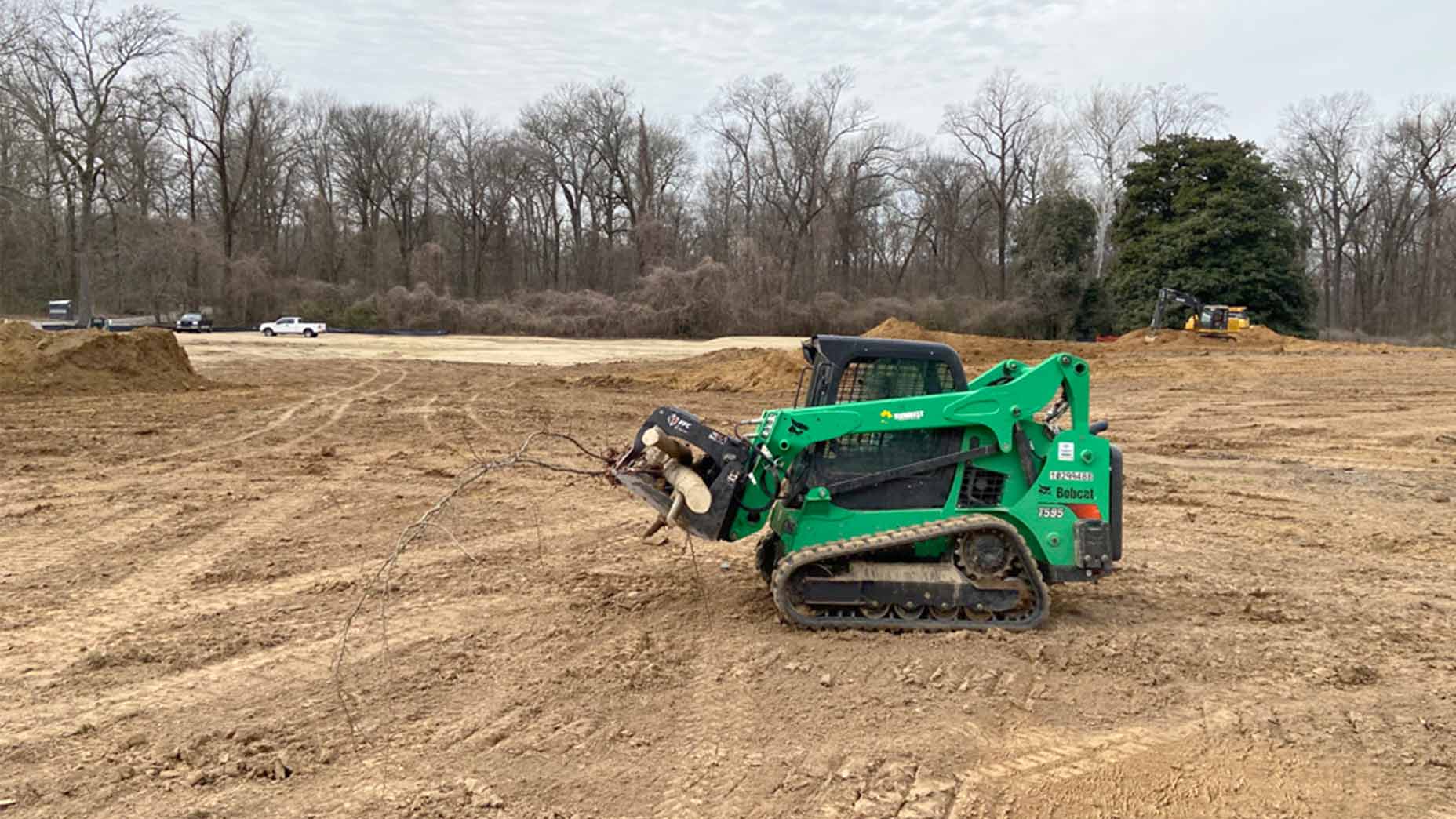 A skid steer at Overton Park.