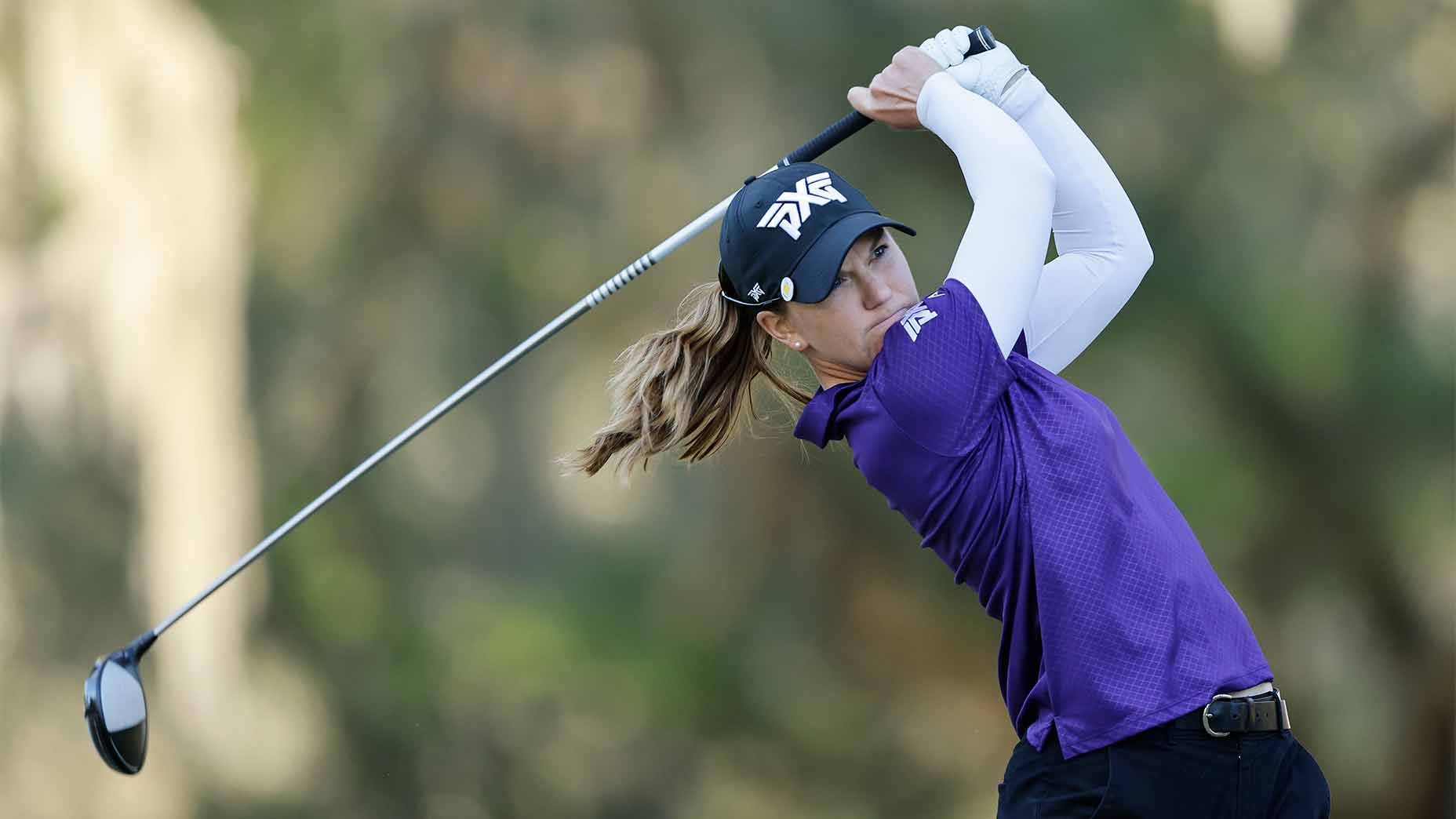 Austin Ernst watches a tee shot on Sunday.