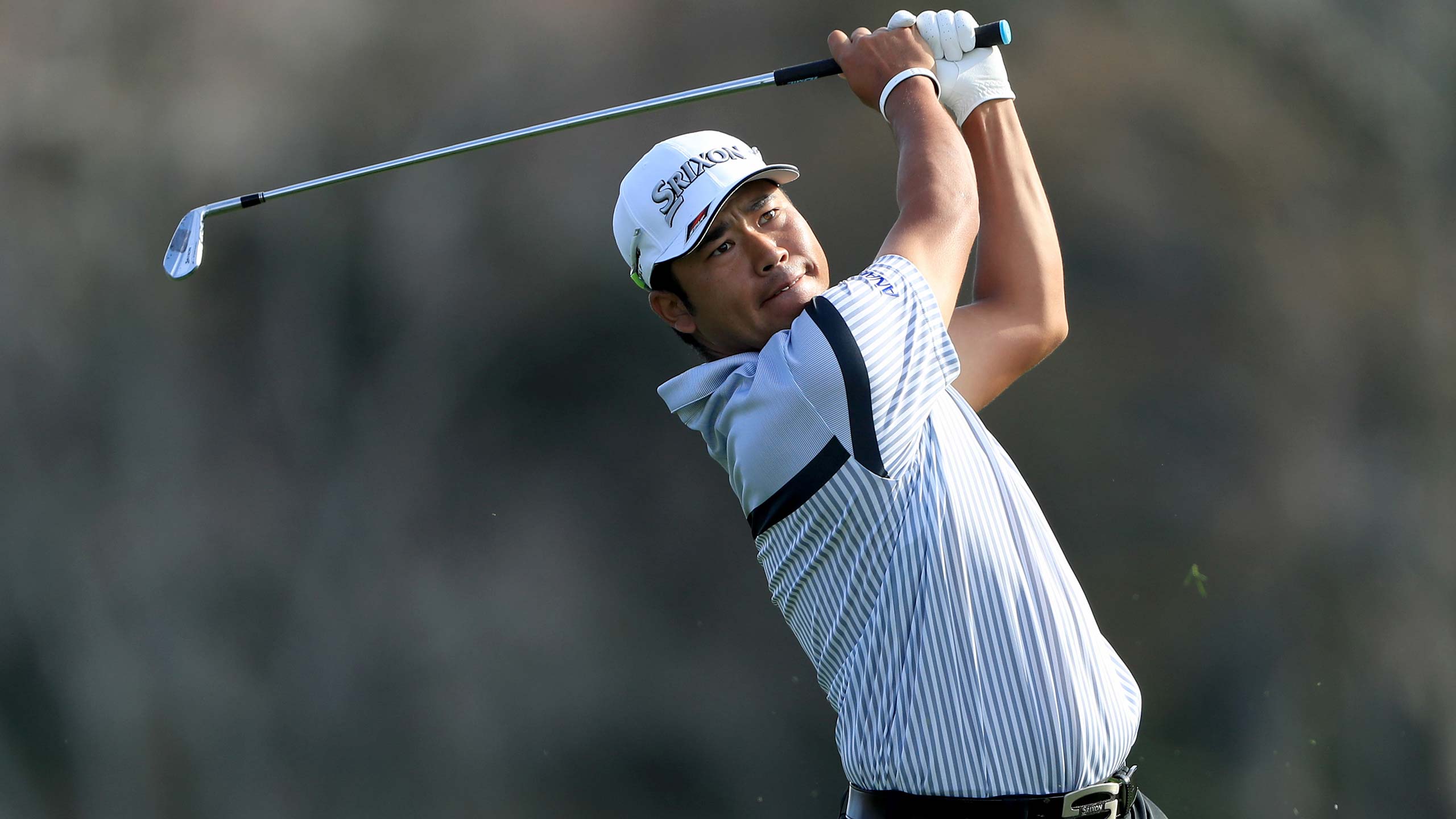 hideki matsuyama hits shot