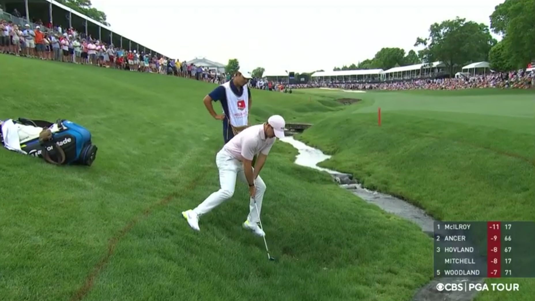 Rory McIlroy and Harry Diamond confronted a decidedly awkward lie late in Sunday's round.