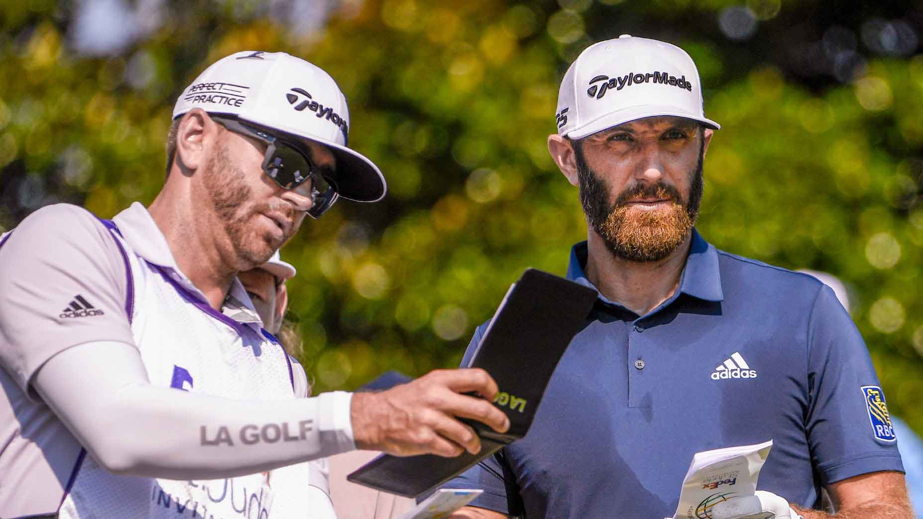 Dustin Johnson and caddie Austin