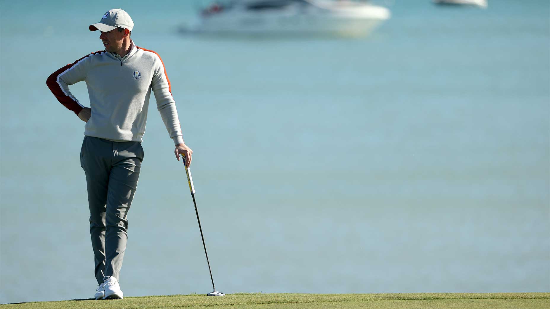 Rory McIroy looks off in the distance at the 2021 ryder cup.