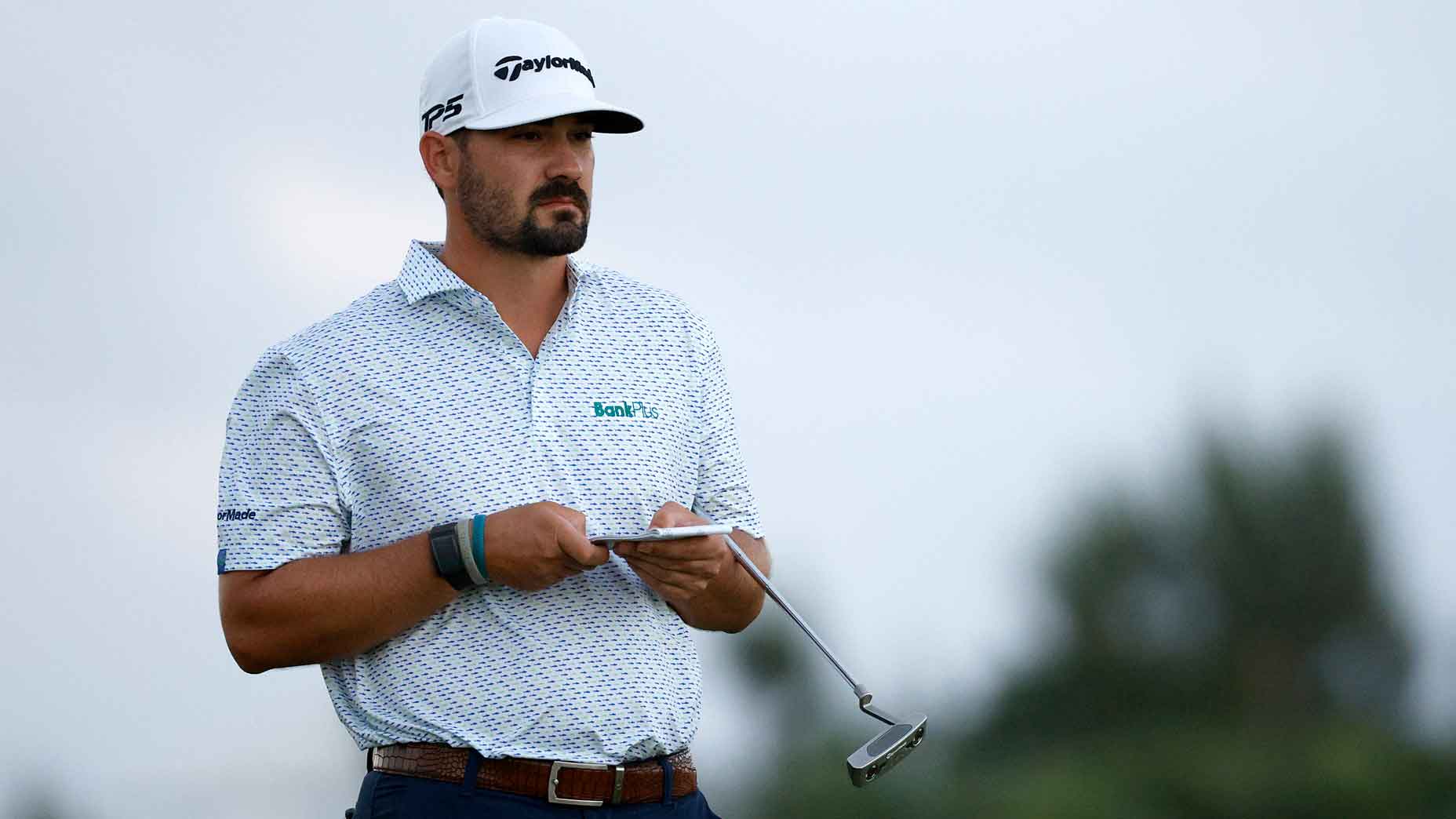 Chad Ramey assesses a shot