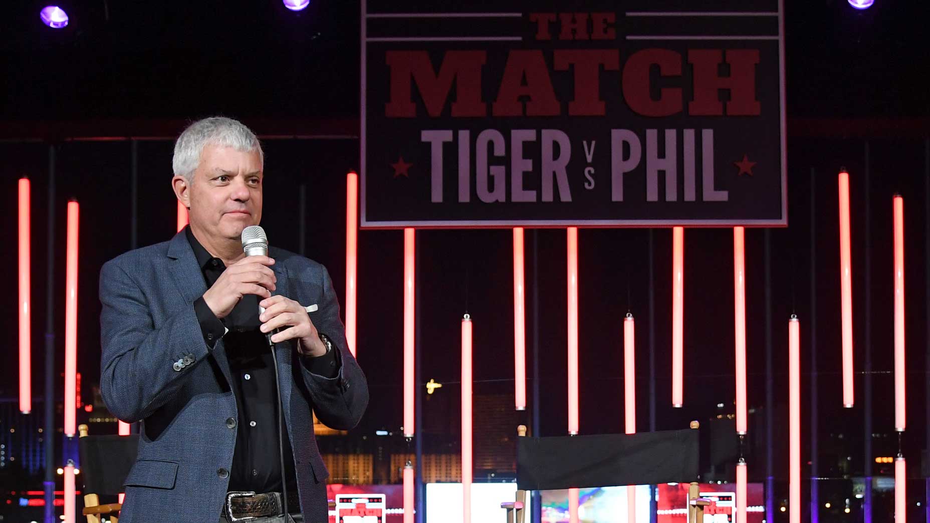 david levy holds microphone