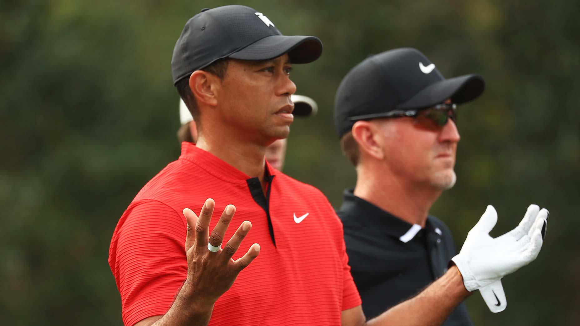 Tiger Woods raises hands during 2021 PNC Championship