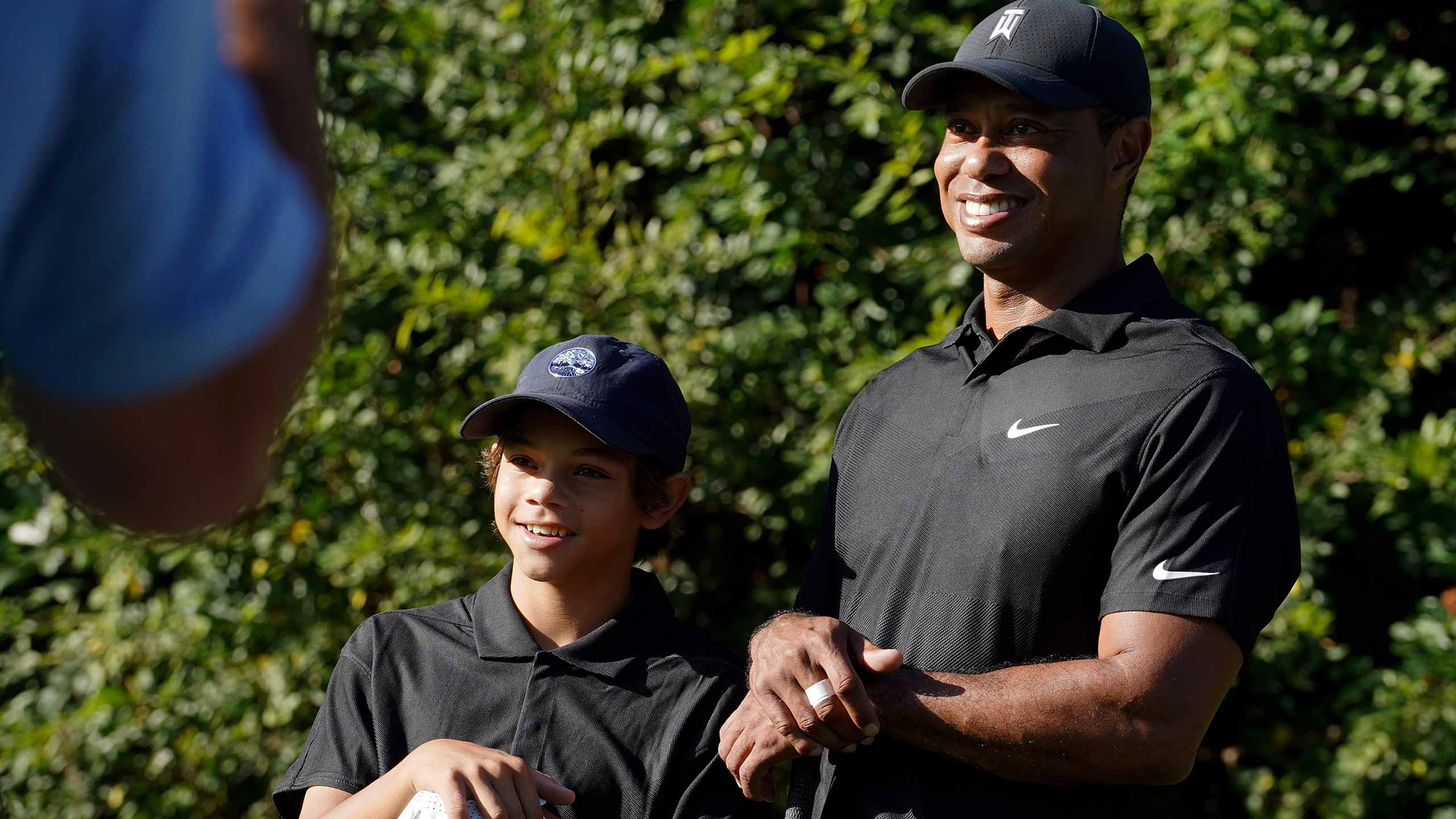 tiger and charlie woods smile
