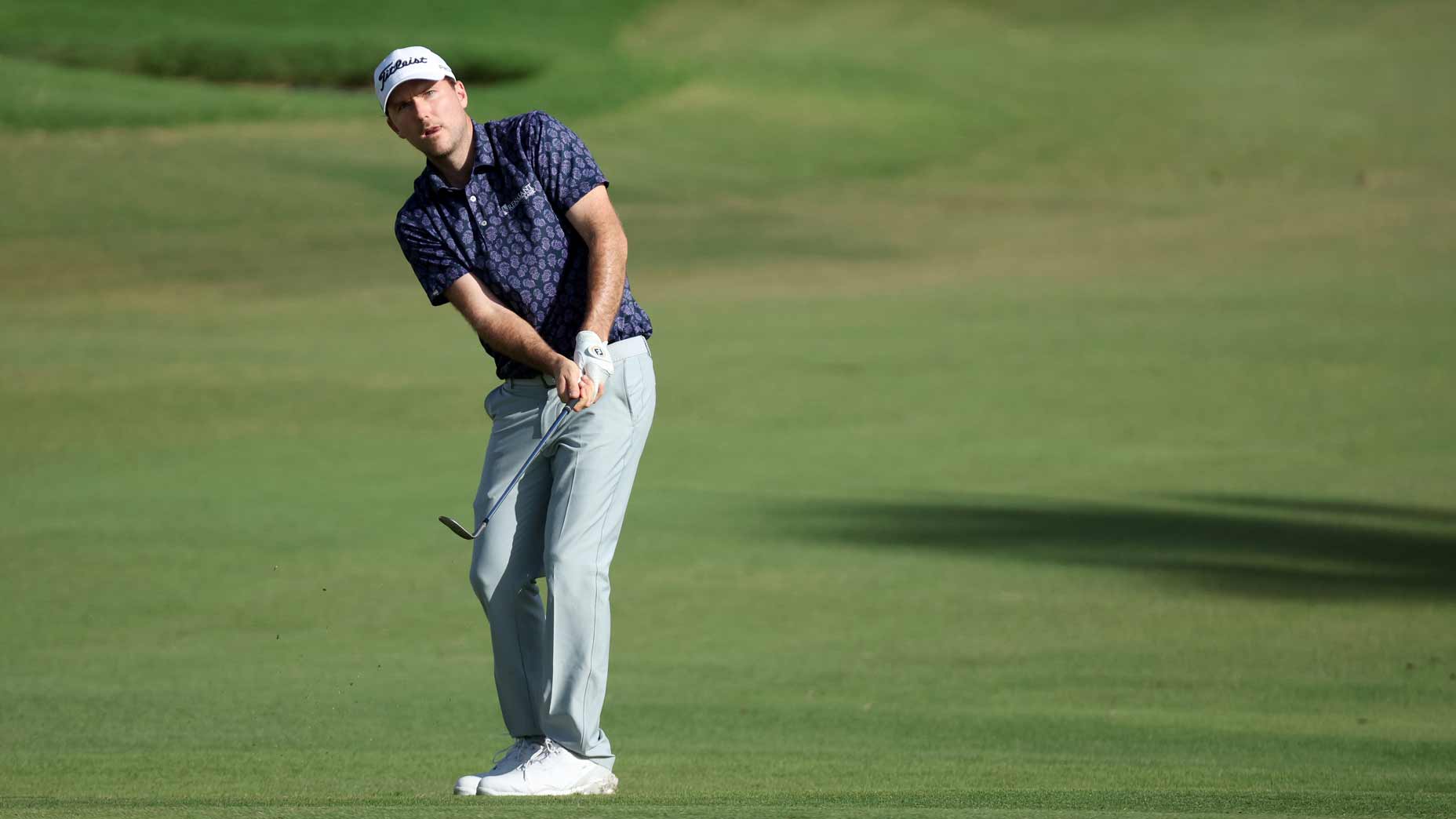 russell henley hits chip shot