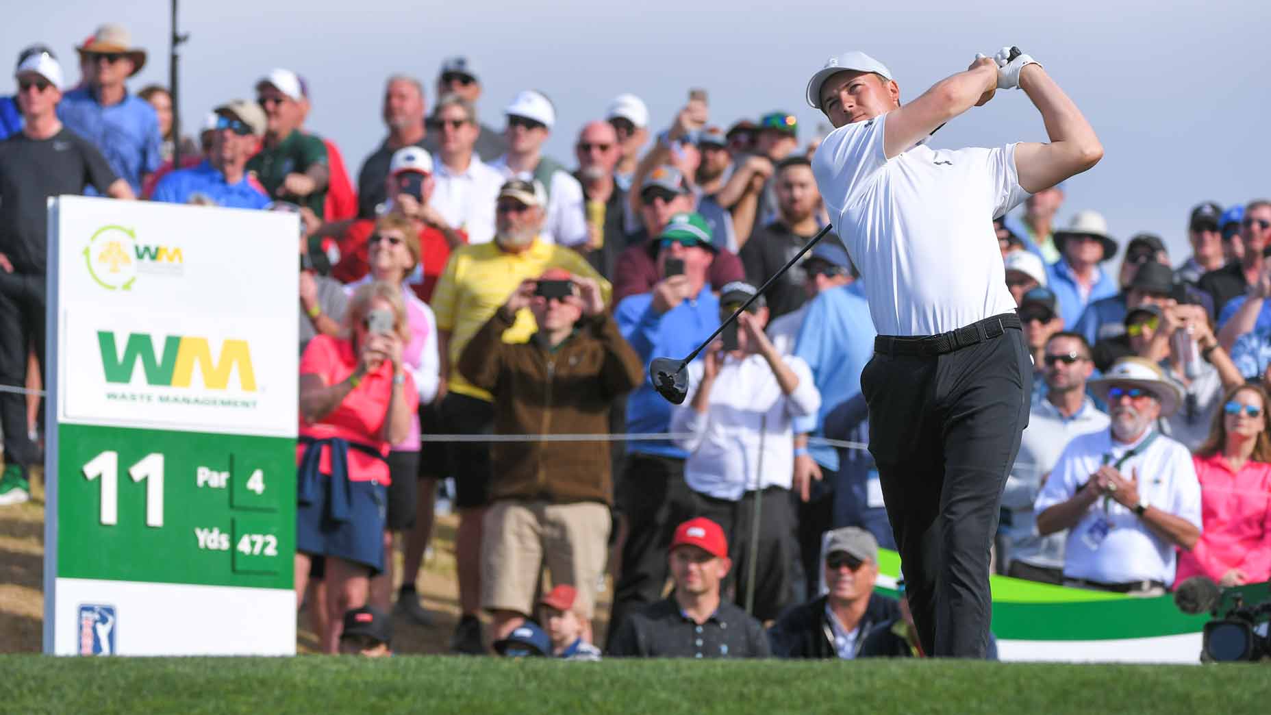 Jordan Spieth tees off during 2021 Waste Management Phoenix Open