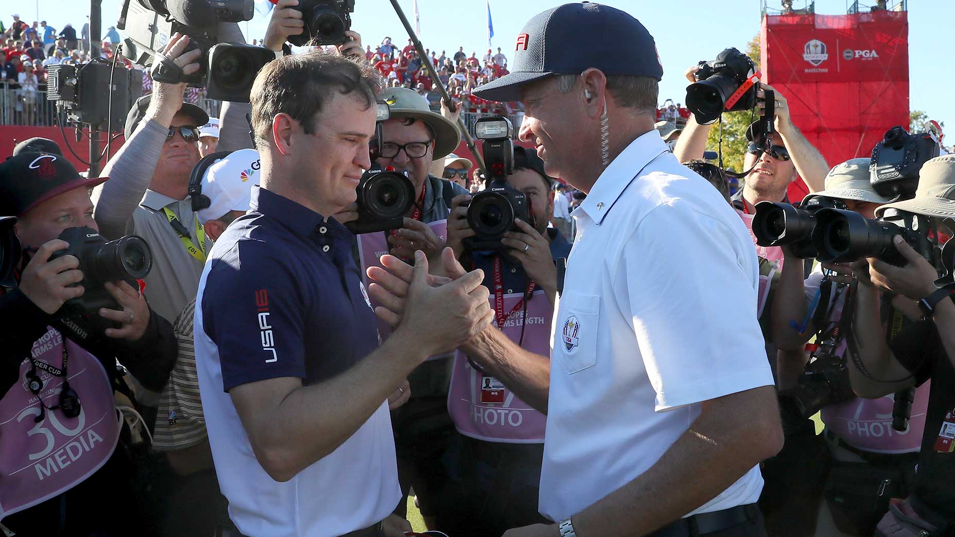 Zach Johnson and Davis Love III celebrate after the U.S. won the 2016 Ryder Cup at Hazeltine in Chaska, Minnesota.