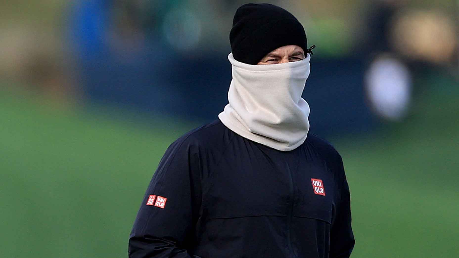 PGA Tour pro adam scott looks cold as if it's winter