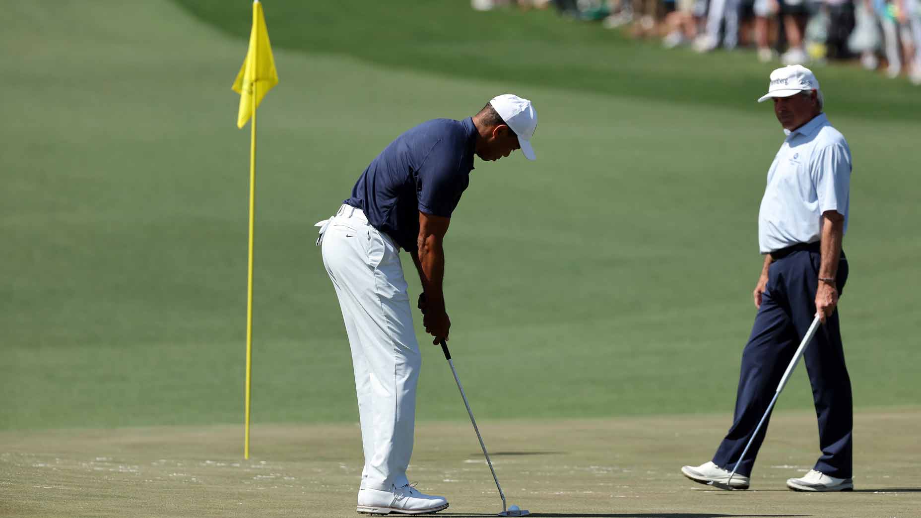 Tiger Woods and Fred Couples on Monday at the Masters.