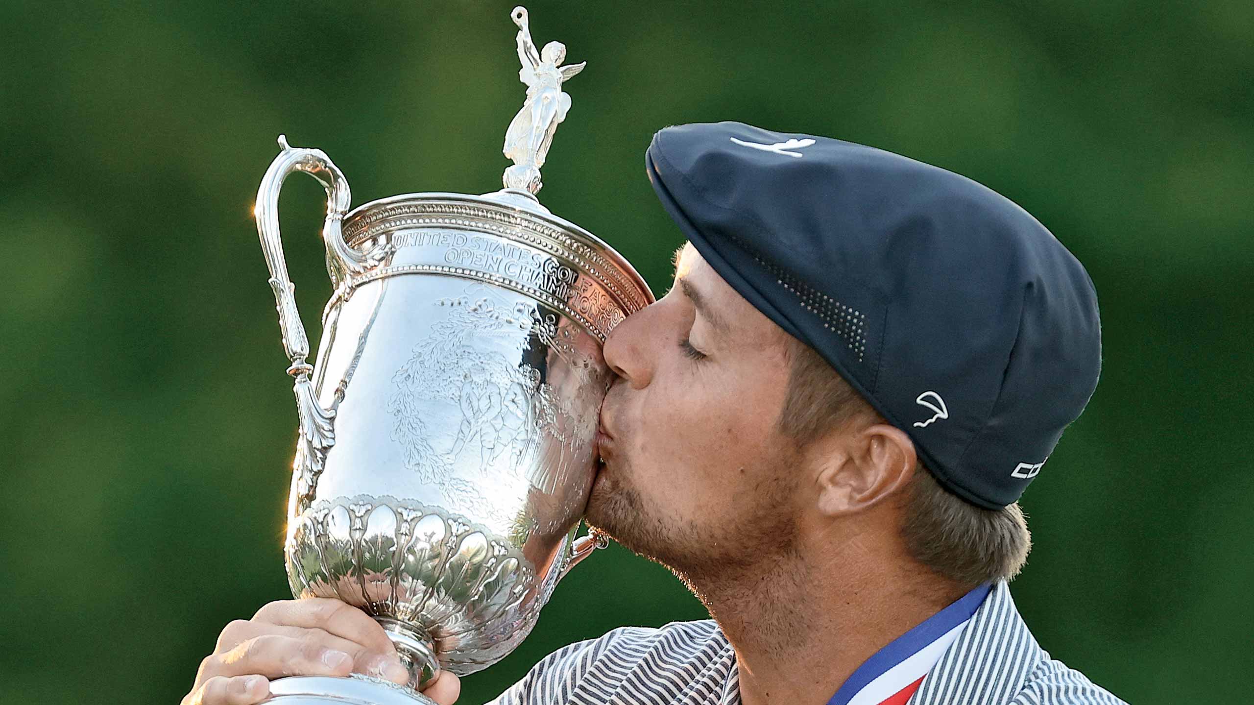 bryson dehcmabeau kisses trophy