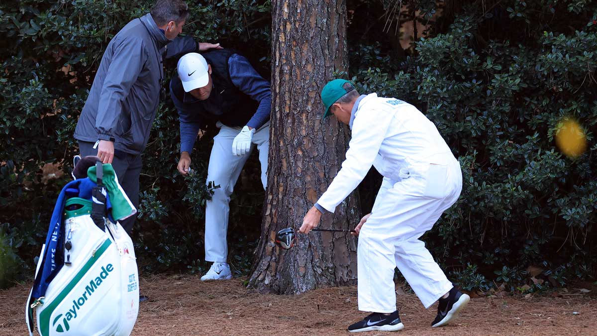 scottie scheffler in bushes at masters
