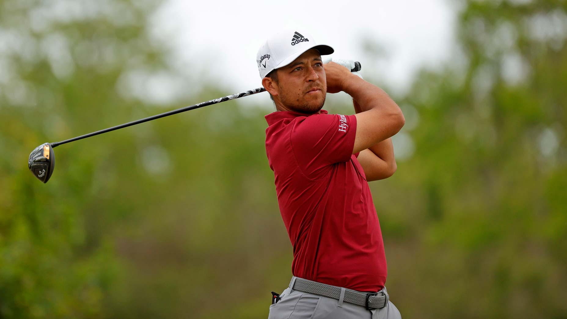 Xander Schauffele hits tee shot during 2022 Zurich Classic