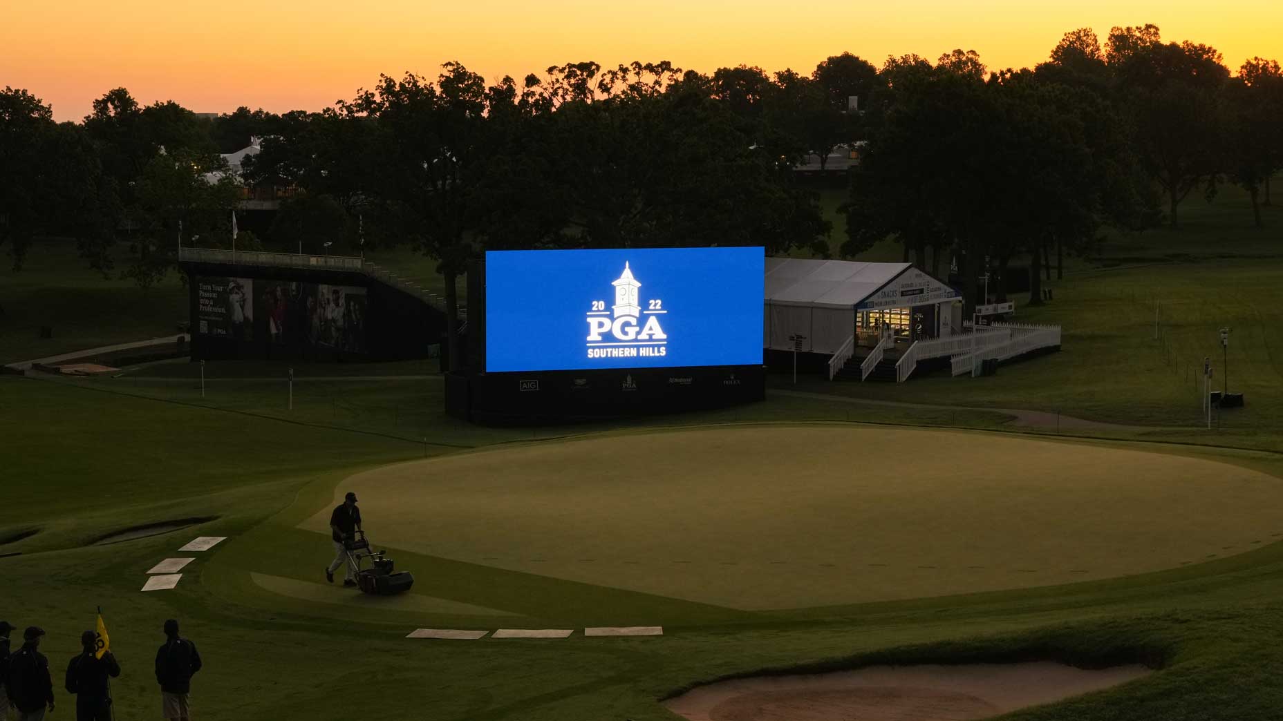 Workers prepare Southern Hills golf course for 2022 PGA Championship in the dark