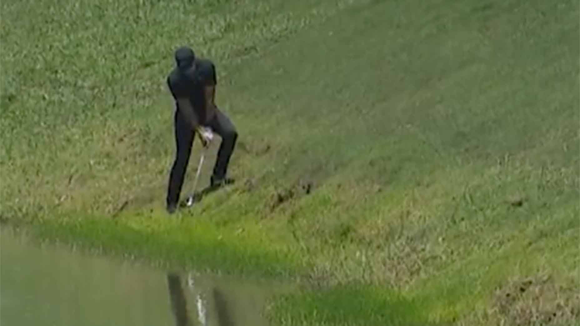 Cameron Champ tries to hack back onto the fairway on the 8th hole on Sunday.