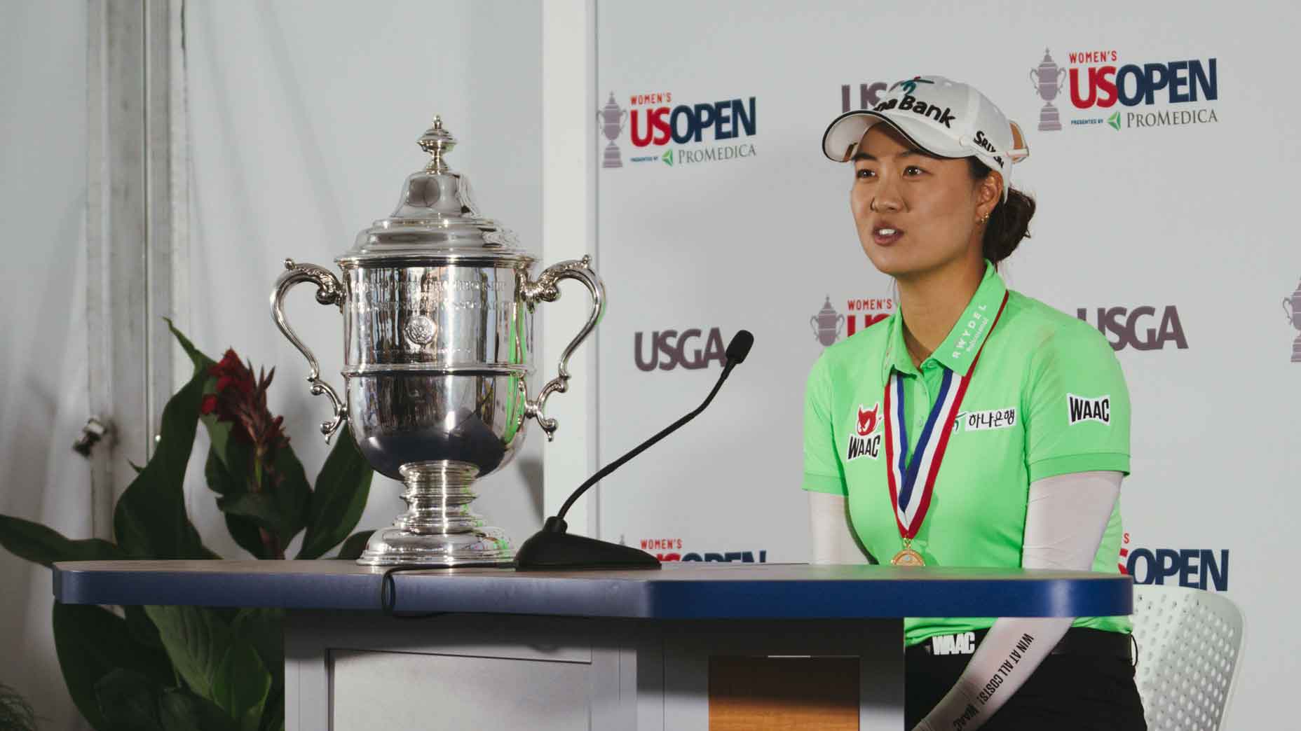 minjee lee addresses the media