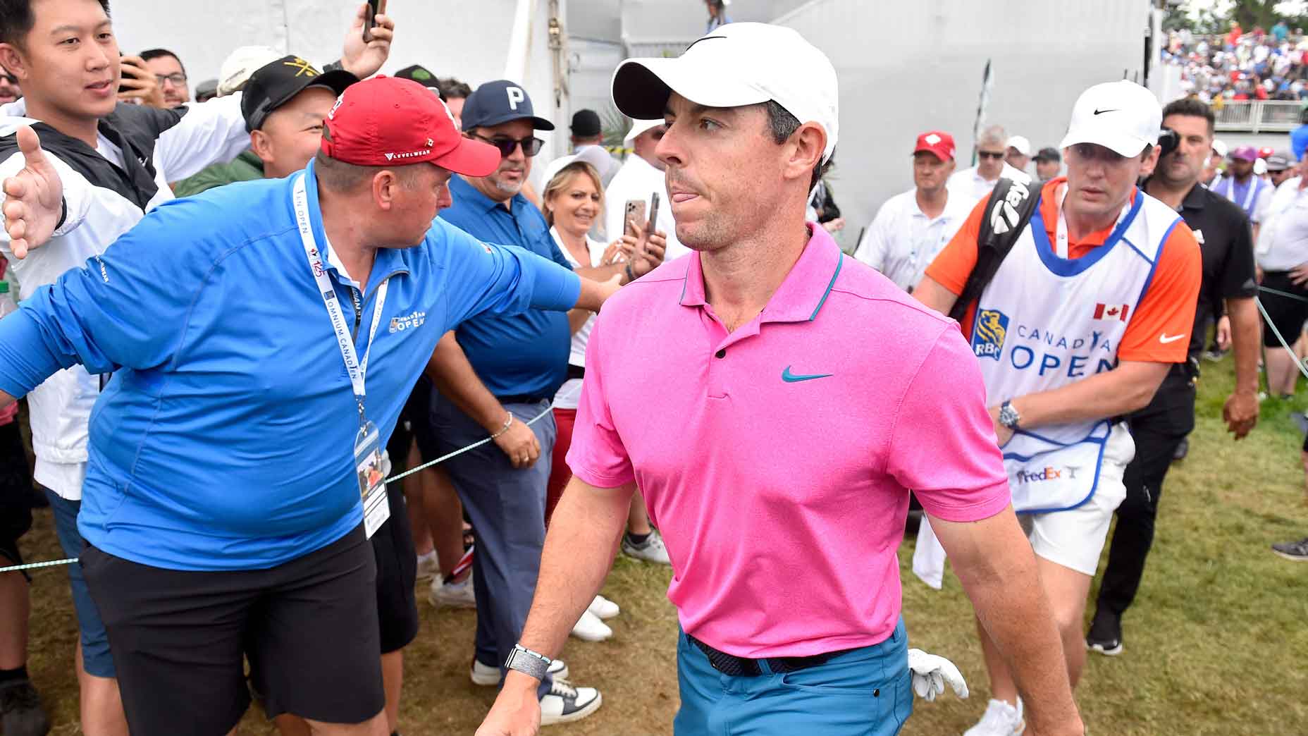 Rory McIlroy walks by fans during 2022 RBC Canadian Open