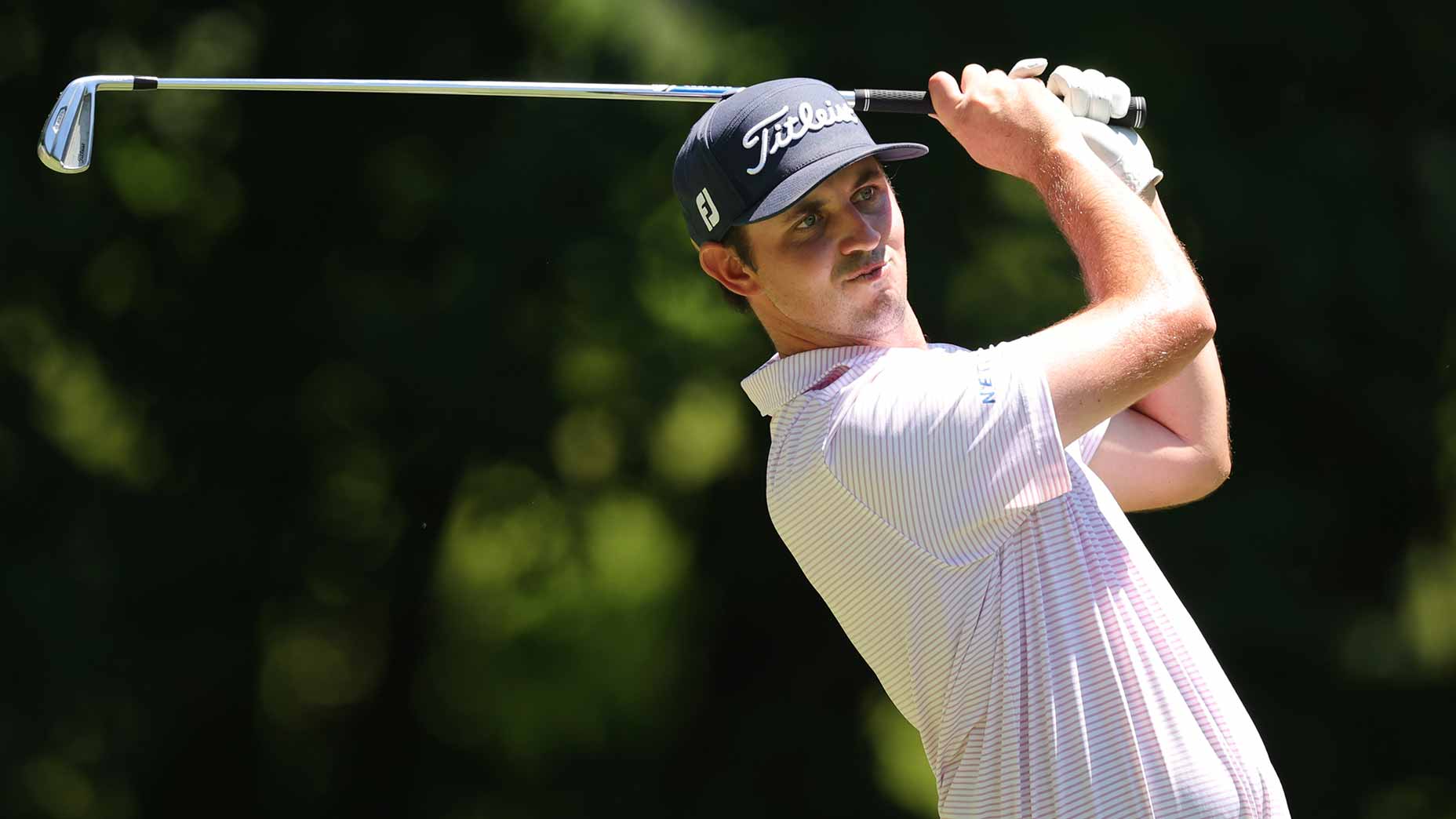 jt poston swings iron