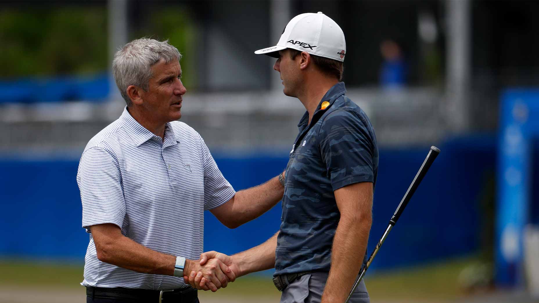 sam burns shakes hands jay monahan