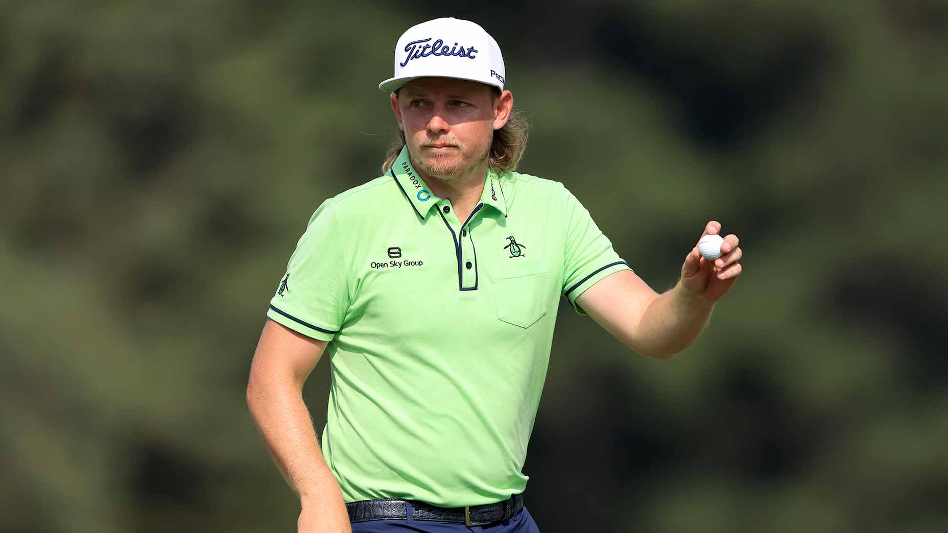 Cameron Smith waves to the crowd.