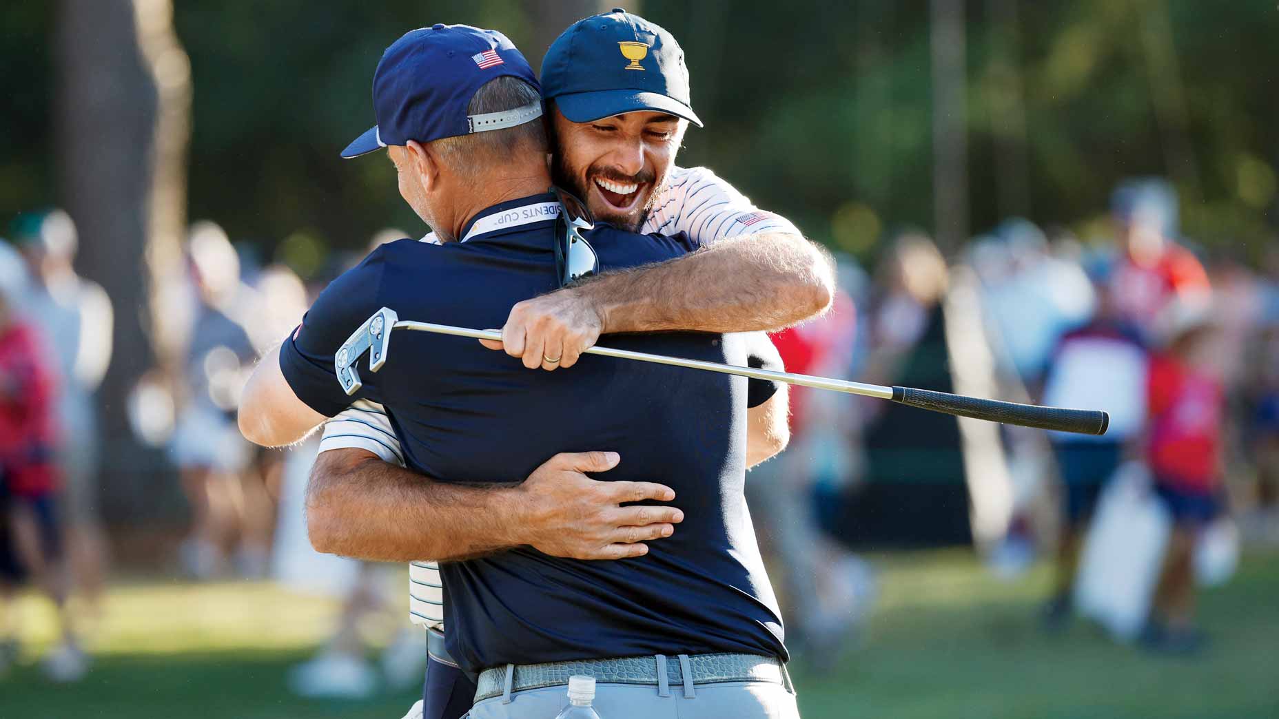Max Homa and Joe Greiner celebrating at the Presidents Cup.